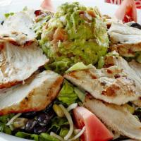 *Santa Fe Chicken Salad · grilled chicken, black beans, corn, tomatoes and guacamole over romaine lettuce topped with ...