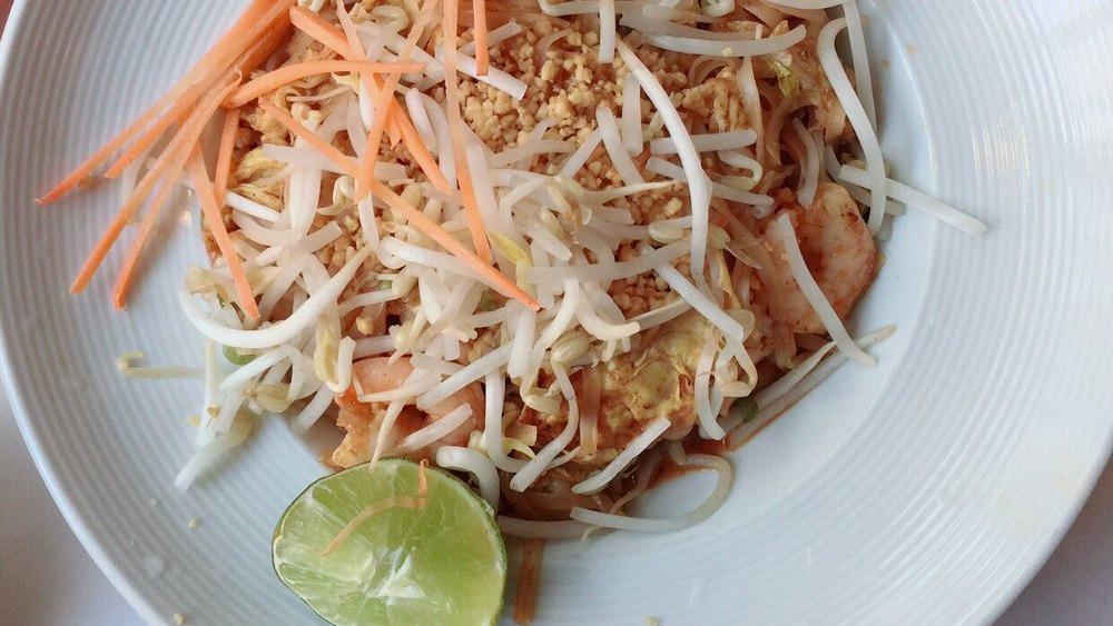 Pad Thai Noodles · Served with choice of protein.