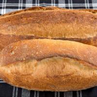 Pugliese · An oval loaf with a chestnut-colored, open crust and irregular crumb structure. It is recogn...