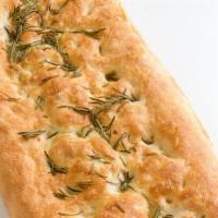 Pizza Bianca · Six foot long foccacia topped with sea salt and rosemary.