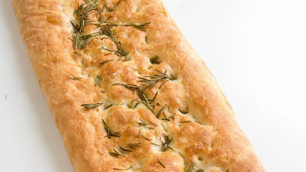 Pizza Bianca · Six foot long foccacia topped with sea salt and rosemary.