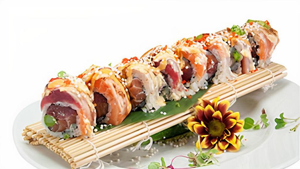 2011 Roll · Tuna, salmon, yellowtail and asparagus, topped with tuna, salmon and yellowtail with chef's miso sauce.