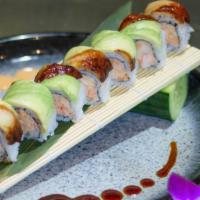 Kumo Roll · Spicy lobster salad, shrimp tempura, eel and avocado wrap soy paper and honey sweet sauce.