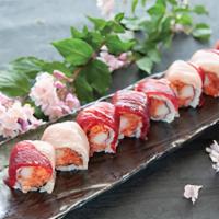 Rich Roll · Spicy tuna crunch crab, topped with tuna & yellowtail.