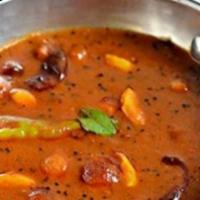 Poondu Kozhambu · Tamarind/Garlic/Tomato/Pepper/Curry leaves