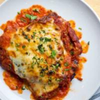 Chicken Parmigiana · Large. Chicken breast fried with tomato sauce and mozzarella cheese.