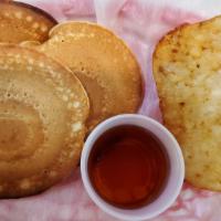 Pancake Breakfast · 3 Pancakes, a Hash brown, served with Maple Syrup