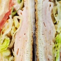 Turkey Delight Sandwich · Turkey, bacon, Swiss cheese, tomatoes, lettuce and ranch dressing.