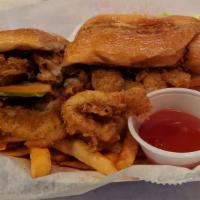 Catfish Po Boy · French bread, lettuce, tomato, and tartar sauce. Served with fries.
