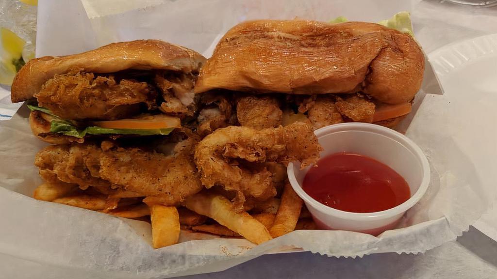 Catfish Po Boy · French bread, lettuce, tomato, and tartar sauce. Served with fries.