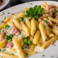 Pasta Carbonara · Bacon, onions, peas, and parmesan cheese in a cream sauce.