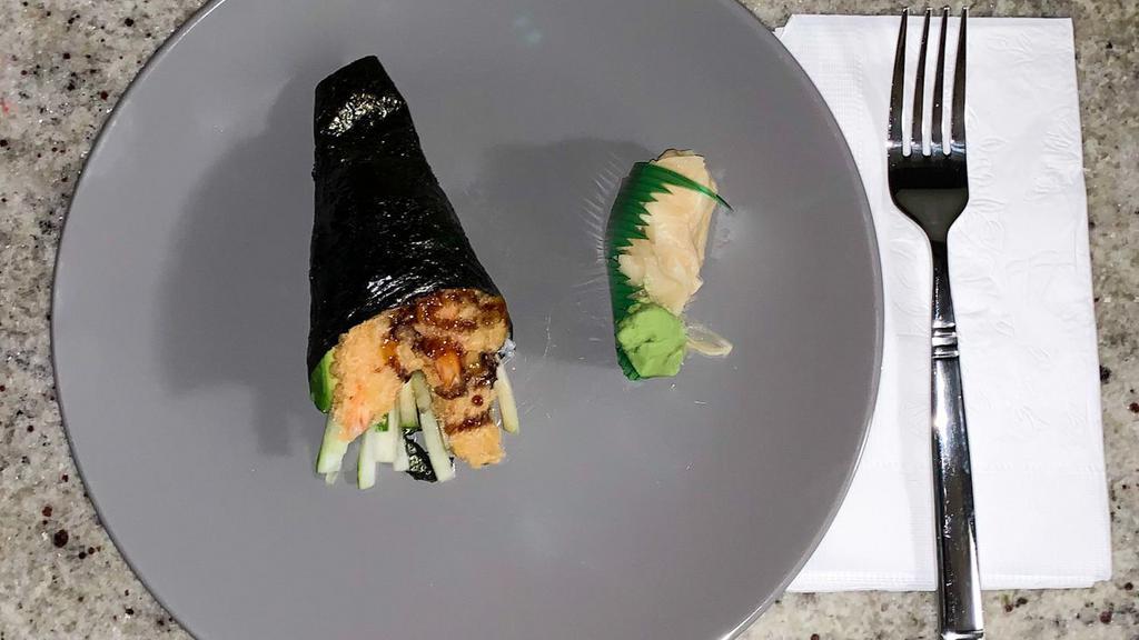 Shrimp Tempura Roll · Served with masago avocado cucumber and special sauce.