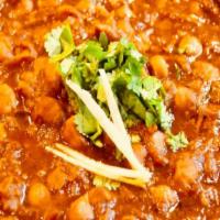 Wholesome Channa Masala · Vegan, gluten free. Chickpeas cooked with traditional homemade spices.