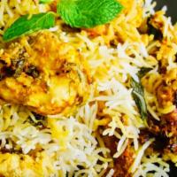 Shrimp Biryani · Gluten free. Shrimp cooked in herbs and spices with fragrant basmati rice.