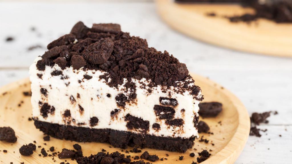 Oreo Cheesecake · A rich and creamy New York-style cheesecake baked inside a honey-graham crust with oreos.