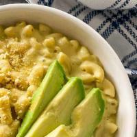 Chicken Avocado Mac · Grilled chicken breast and sliced avocado on top of cavatappi noodles with homemade 3 cheese...