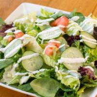 Garden Salad · Organic mixed greens, romaine lettuce, cucumbers, tomatoes and house dressing.