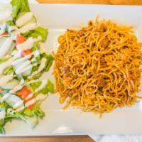 Persian Spaghetti (Macaroni) · Slowly cooked spaghetti on a fresh tomato based sauce and ground beef, served with garden sa...