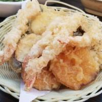 Shrimp And Veggie Tempura Appetizer · Shrimp and Vegetable tempura mix with tempura sauce on the side.