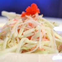 Kani Salad · Cucumber, Kani, mix green on the bottom mixed with mayo. some caviar on top