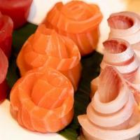 Tri-Color Sashimi Platter · 6 pcs of tuna, 6 pcs of yellowtail, 6 pcs of salmon. rice on the side