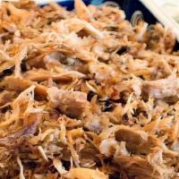 Confit Turkey Dark Meat · Thighs and Drums cooked confit style and shredded.  <br />Price per pound<br />Recommended 1...