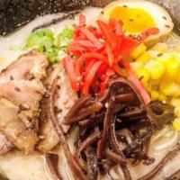Seafood Tonkotsu Ramen  · Tonkotsu (pork) and seafood based broth noodle soup with pork belly chashu, kikurage mushroo...