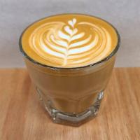 Cortado · An 8oz traditional cortado with a double shot of espresso and steamed, warmed milk