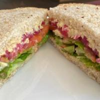Hummus Sandwich · Our chickpea hummus, lettuce, tomato, and pickled onions
