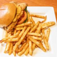Crispy Chicken Sandwich · Lettuce, tomato, onions, and house mayo. Served with fries.