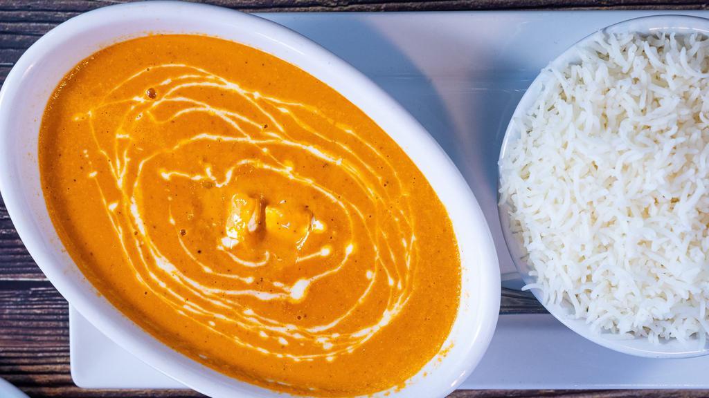 Butter Chicken · Gluten-free. Chicken pieces simmered in a sauce made with butter, cream, yogurt, and spices.