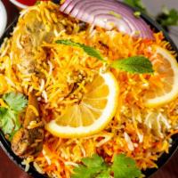 Chicken Dum Biryani (Bone In) · Gluten-free.  Hot. Fragrant basmati rice layered and slow cooked with tender pieces of chick...