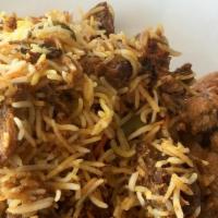 Lamb Biryani · Gluten-free. Hot. Boneless. Basmati rice cooked with tender chunks of Lmab, blended with her...