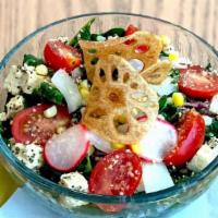 Rainbow Chard · White bean & hemp seed cotija, tofu feta, fresh corn, cherry tomatoes, lotus chips, avocado-...