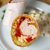 California Turkey Wrap · Roasted turkey, bacon, roasted red peppers, lettuce, tomato, and feta cheese.
