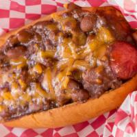 Lassie Chili Cheese Dog · Smothered in meat and bean chili and shredded cheddar cheese.