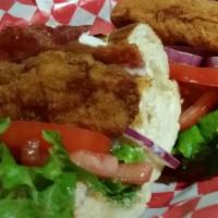 Magnum Pi Fried Chicken & Bacon Sandwich · Fried chicken strips, bacon and ranch dressing.