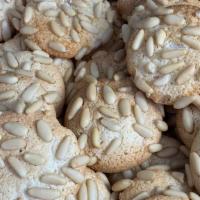Pignoli Cookies · Traditional Italian Cookies topped with Pine nuts. 

Price of pignoli cookies change seasona...