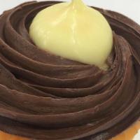 Boston Cream · Vanilla cake, filled with Boston cream filling, frosted with chocolate fudge