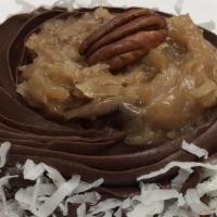 German Chocolate  · Chocolate cake filled and with German chocolate, frosted with chocolate fudge, edged with co...