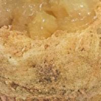 Apple Cobbler  · Vanilla cake filled with apple pie filling, frosted with cream cheese frosting and edged wit...
