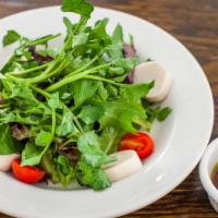 Salada Completa · Sliced heart of palms, watercress, mesclun greens and cherry tomatoes