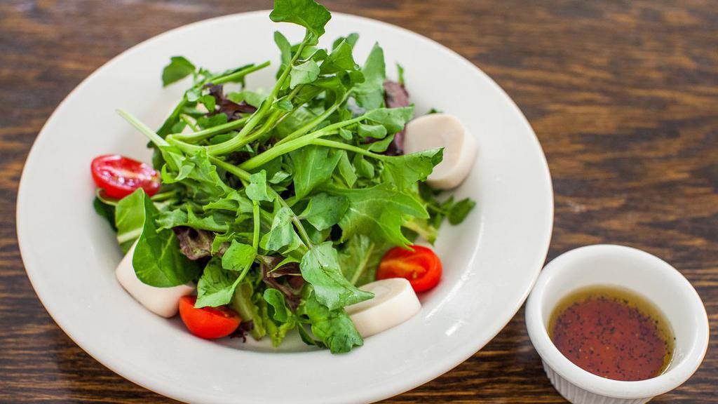 Salada Completa · Sliced heart of palms, watercress, mesclun greens and cherry tomatoes