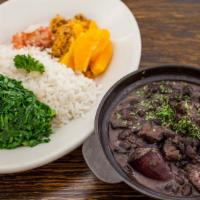 Feijoada · Brazilian national dish: black bean stew with prime meats served with white rice, fresh oran...