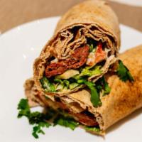 Kofte Wrap · Ground lamb and beef patties, tomatoes, lettuce, onions. Served with french fries. Wrap incl...