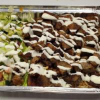 Lamb Platter · Served over brown basmati with choice of salad and sauce.