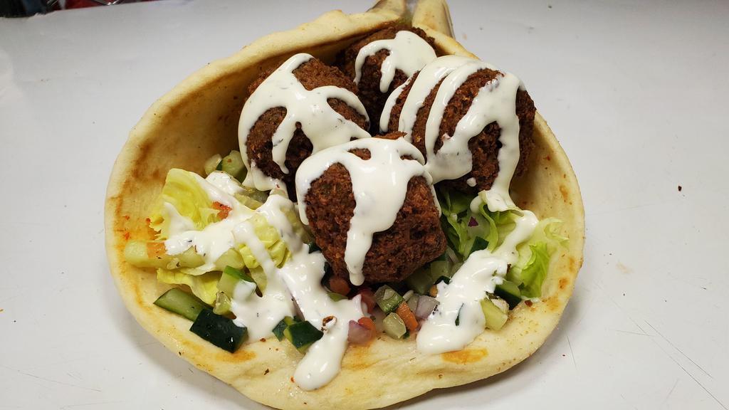 Falafel Gyro · Served on Pita with Choice of Salad and Sauces