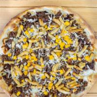 Philly Cheese Steak Pizza · Steak, onions, American & mozzarella cheese.