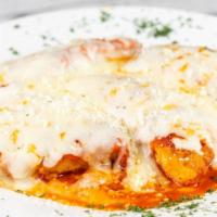 Chicken Parmigiana Pizza · Breaded chicken, mozzarella & tomato sauce.