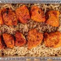 Chicken Tikka · Top rated. Two skewers. Served with rice, salad, and bread.